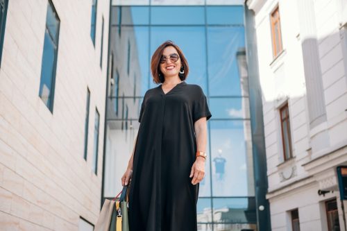 middle aged woman in loose black dress