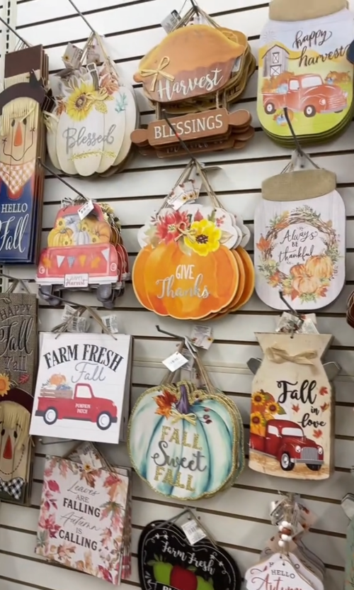 fall signs on display at Dollar Tree