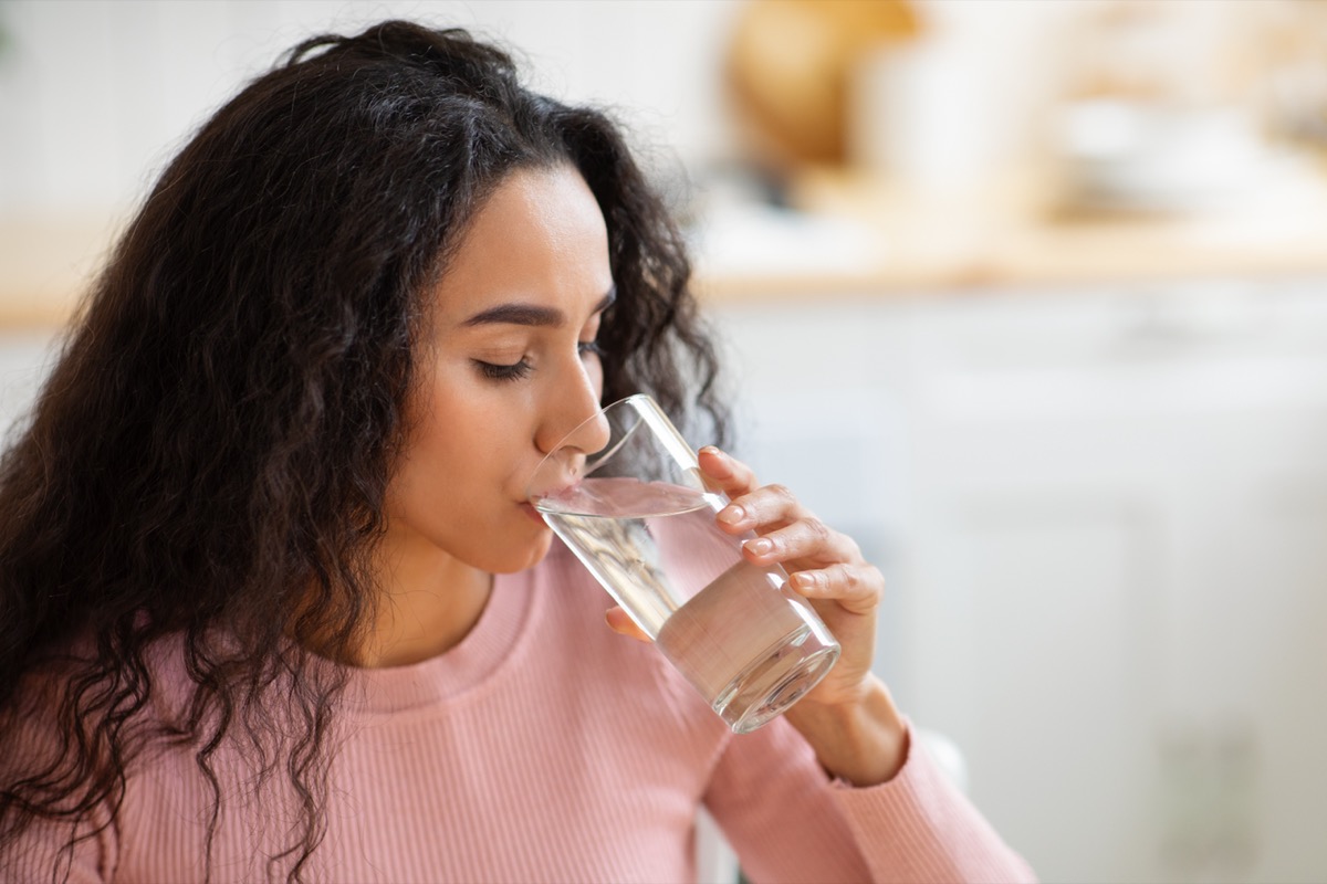 Woman Drinking Water From Glass