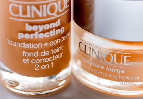 Close up of bottles of cosmetic skin care products by Clinique.