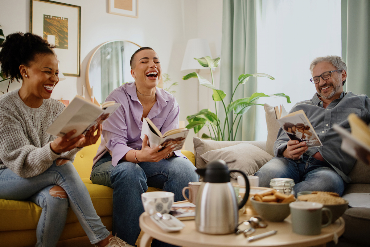 people laughing at a book club