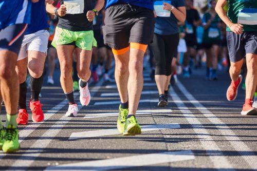 Runners on the street. Healthy lifestyle. Motion exercise. Athletics