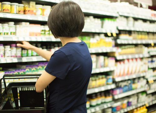 Woman Shopping for Supplements