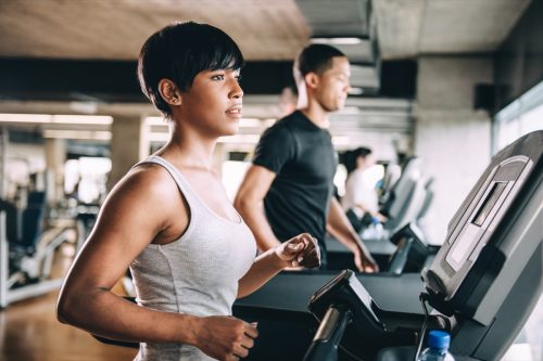 Diverse People Running on Treadmill