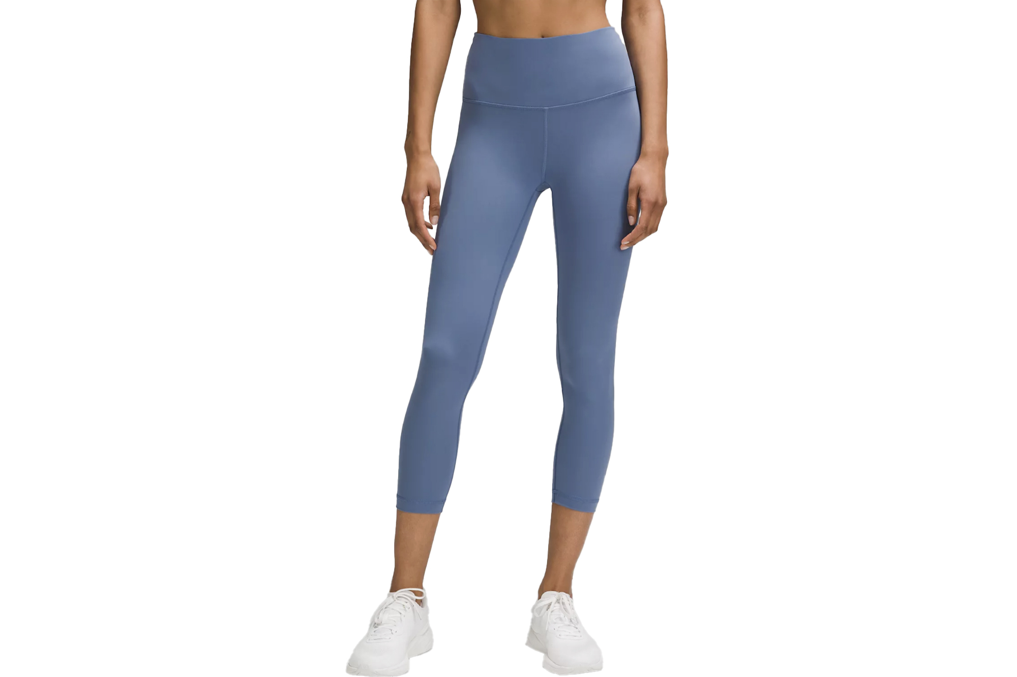 Một người mẫu mặc quần legging màu hoa cà