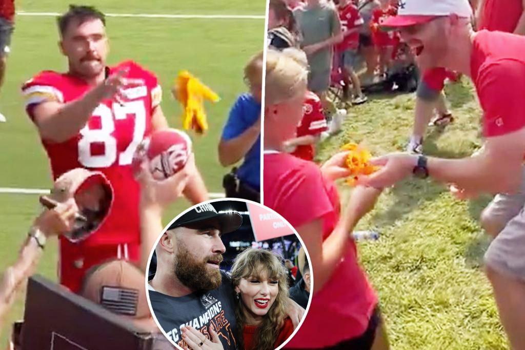 Travis Kelce tặng găng tay cho người hâm mộ Taylor Swift tại trại huấn luyện của Kansas City Chiefs